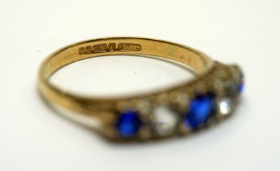 Lot 211 - A sapphire and diamond ring and another