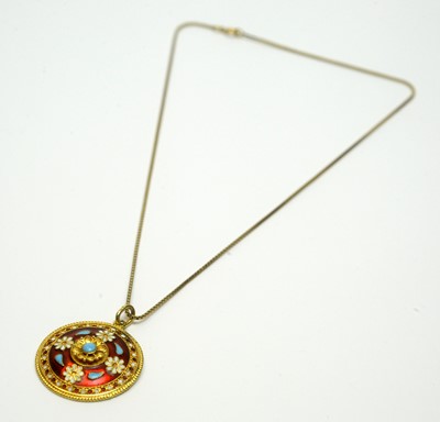 Lot 216 - An enamel and gilt metal pendant, on gold chain