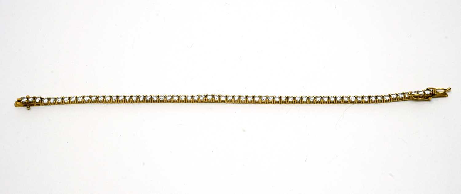 Lot 186 - A white stone set line or tennis bracelet