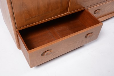 Lot 66 - Lucien Ercolani, Ercol: a retro vintage 1960s mid 20th Century solid elm wood sideboard credenza.