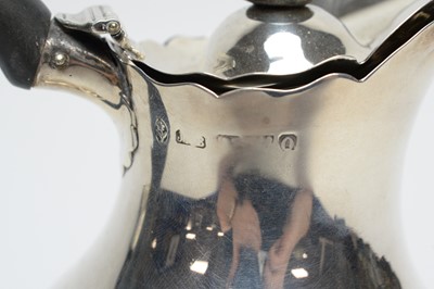 Lot 211 - A silver water jug