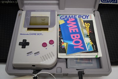 Lot 322 - A Sega Mega Drive computer game console; together with a selection of games; and a Nintendo Gameboy