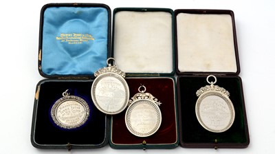 Lot 276 - Four Edwardian George V silver prize medals