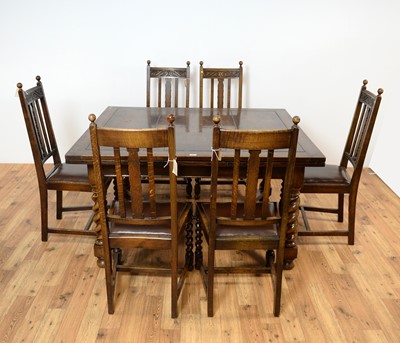 Lot 69 - A 20th Century Jacobean revival oak dining suite