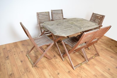 Lot 27 - A Rawlinson Garden Products teak garden table and 8 chairs