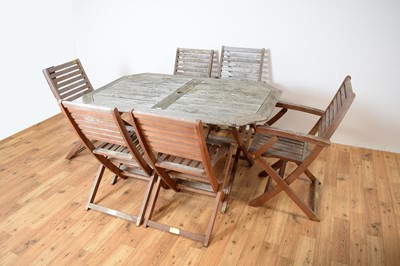 Lot 27 - A Rawlinson Garden Products teak garden table and 8 chairs