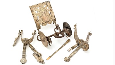 Lot 114 - A 19th Century South American steel gaucho horse bit; together with a pair of gaucho spurs