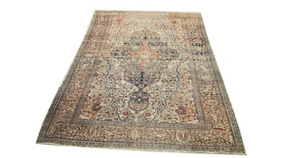 Lot 1160 - An early 20th Century Kirman carpet