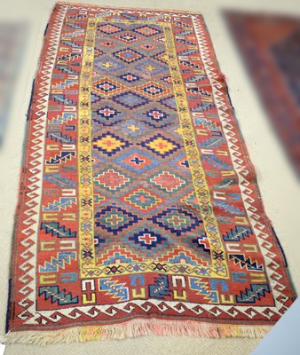 Lot 91 - A 20th Century Kazak Islamic runner rug