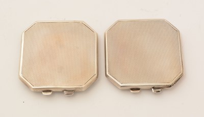 Lot 332 - A matched pair of art deco revival silver and enamel compacts