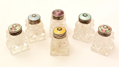 Lot 334 - A set of four mid-20th century silver mounted cut glass pepperettes