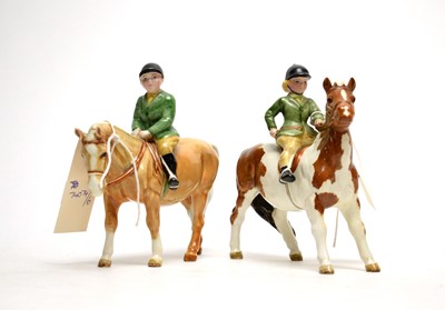 Lot 362 - A pair of Beswick figures, comprising: Girl on Pony; and Boy on Pony.