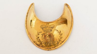 Lot 345 - A regimental gilt copper officers’ gorget