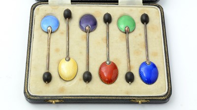 Lot 122 - A George VI cased set of six silver and enamelled coffee spoons