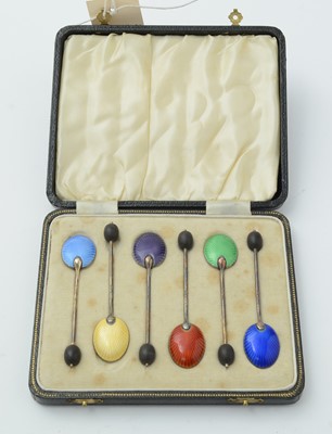 Lot 122 - A George VI cased set of six silver and enamelled coffee spoons