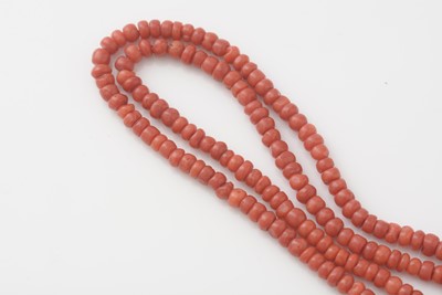 Lot 405 - A two strand coral necklace