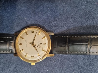 Lot 614 - Omega Seamaster: a 9ct yellow gold-cased automatic wristwatch