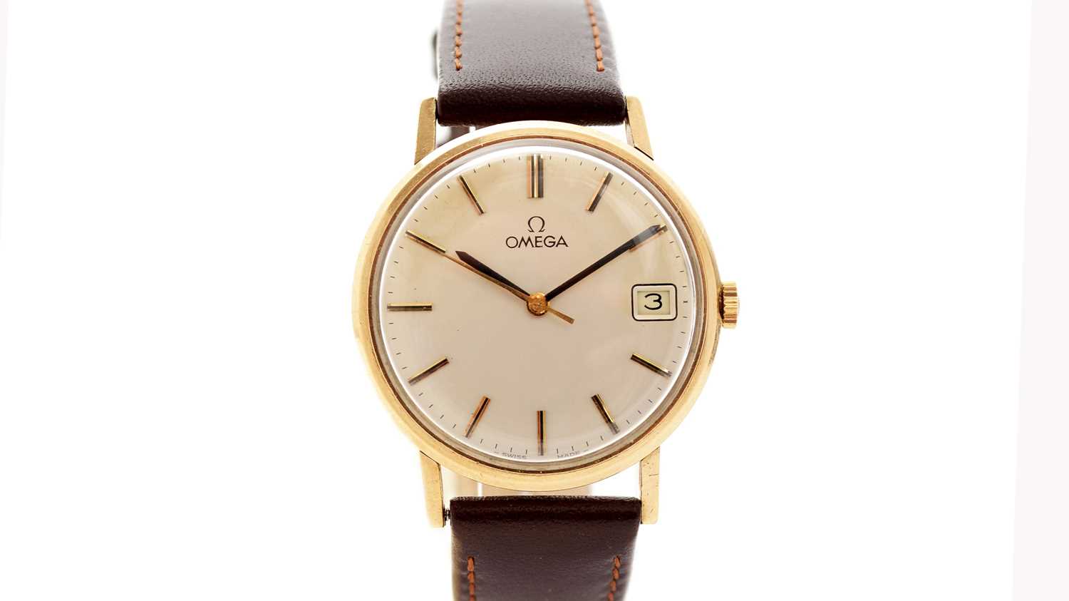 Lot 615 - Omega: a 9ct yellow gold-cased manual wind wristwatch