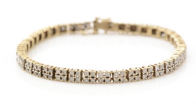 Lot 539 - A diamond line bracelet
