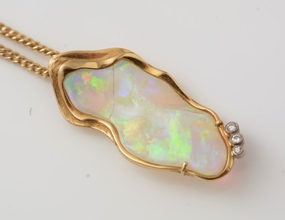 Lot 425 - An opal and diamond pendant