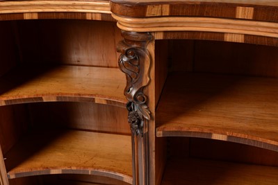 Lot 1343 - Victorian satinwood and coromandel banded serpentine fronted bookcase