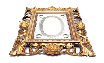 Lot 389 - A 19th Century gilt gesso wall mirror
