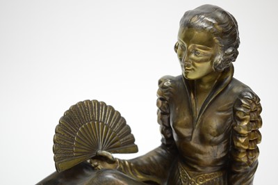 Lot 264 - A bronzed Art Deco figure group of a lady