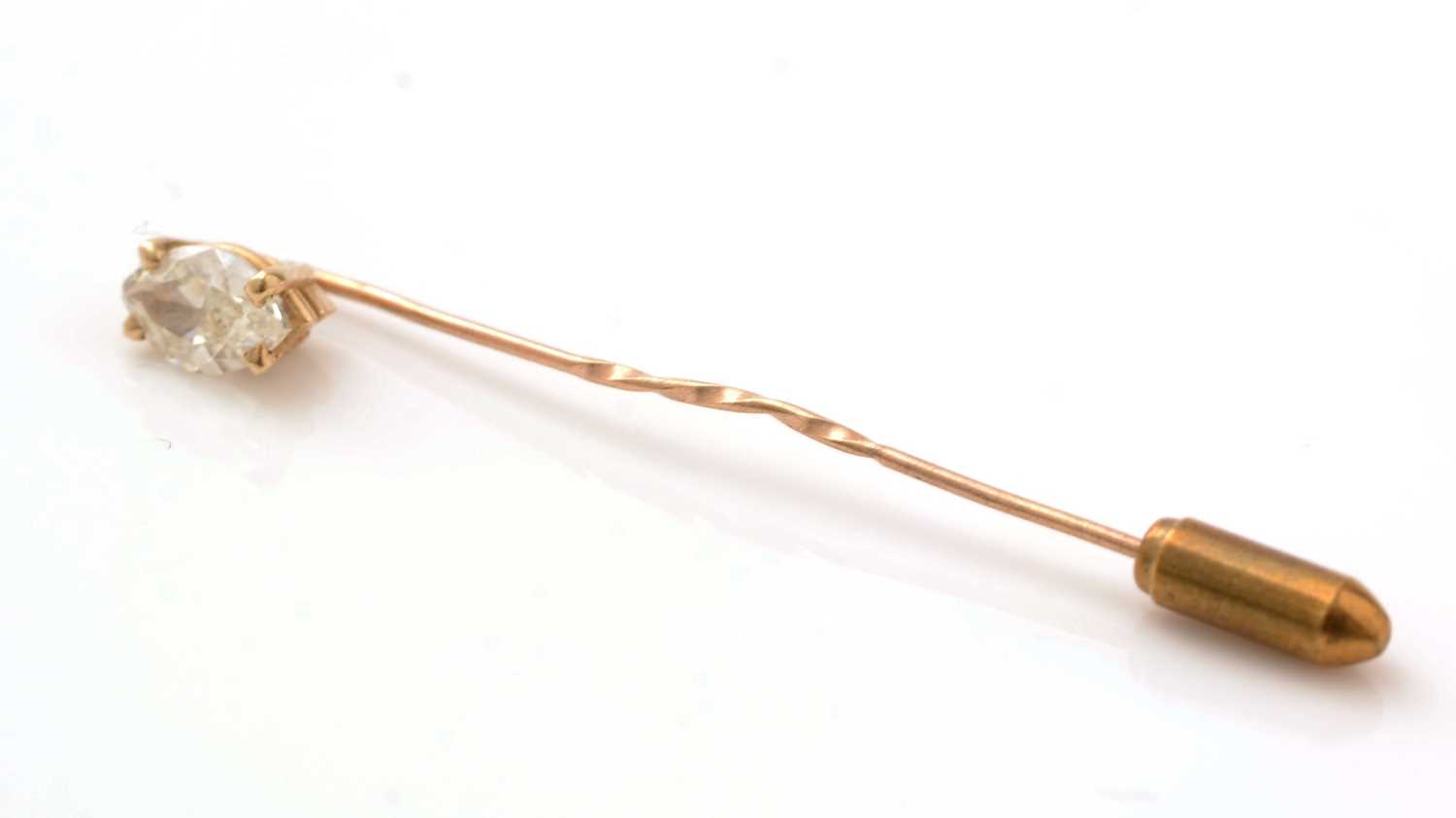Lot 541 - A diamond tie pin