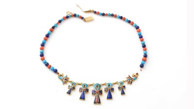 Lot 546 - An Egyptian 18ct yellow gold, coral, turquoise and lapis lazuli necklace