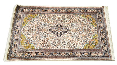 Lot 1162 - A Central Persian silk rug