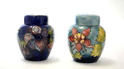 Lot 160 - Two Moorcroft ginger jars and covers
