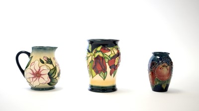 Lot 162 - Two small Moorcroft vases and a jug.