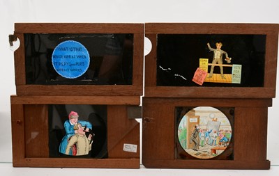 Lot 67 - A collection of 26 early 20th Century mahogany cased slides