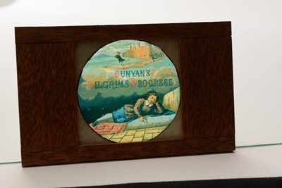 Lot 17 - A collection of 23 early 20th Century mahogany framed Magic Lantern slides