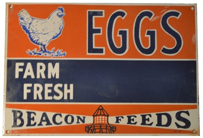 Lot 140 - ﻿An enamel advertising sign, ﻿Beacon Feeds, Eggs Farm Fresh