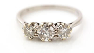 Lot 553 - A three stone diamond ring