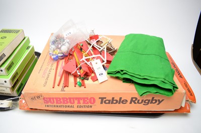 Lot 438 - A collection of Subbuteo table soccer player sets; a table rugby set; and an angling game