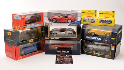 Lot 426 - A selection of 1:18, 1:24, and other scale diecast model vehicles