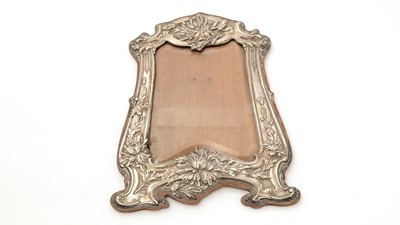 Lot 62 - An Edwardian silver mounted wooden photograph frame
