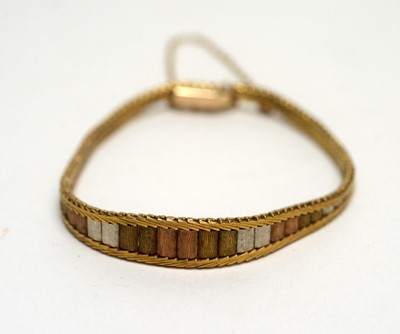Lot 138 - A 9ct three coloured gold bracelet
