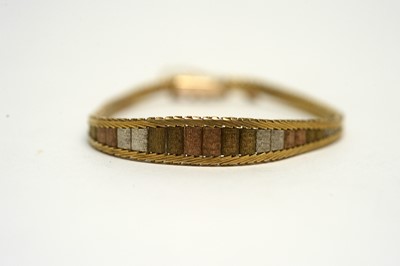 Lot 138 - A 9ct three coloured gold bracelet