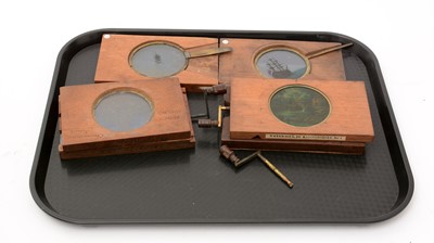 Lot 36 - A collection of six Victorian mahogany springed mechanical lantern slide