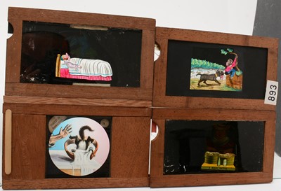 Lot 37 - A collection of Victorian hand-painted mahogany framed Magic Lantern Slides