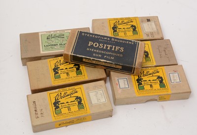 Lot 77 - An early 20th Century Stereoscope Viewer; together with sixteen boxes of stereoscope on film