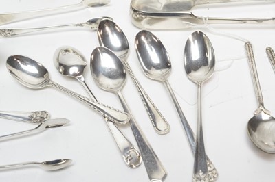 Lot 218 - A selection of silver teaspoons, sugar tongs and condiments and other items