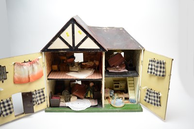 Lot 327 - A Tri-Ang two storey dolls house; together with a selection of dolls and doll accessories