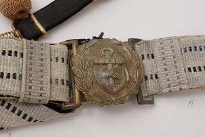 Lot 214 - A German Second World War Kriegsmarine Officer's dress dagger, with hangers and belt