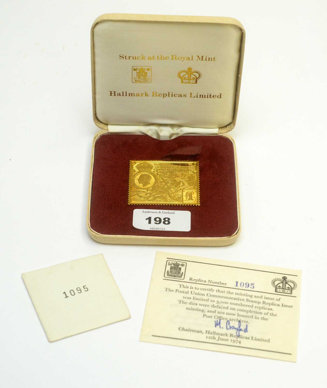 Lot 198 - A 22ct yellow gold medallion replica of the Postal Union Congress London 1919 £1 stamp
