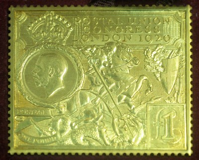 Lot 198 - A 22ct yellow gold medallion replica of the Postal Union Congress London 1919 £1 stamp