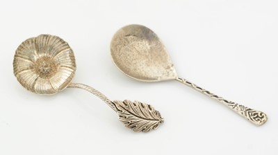 Lot 266 - A late Victorian silver naturalistic caddy spoon; together with a silver caddy spoon by Amy Sandheim